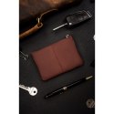 Etui na klucze w brązowym kolorze wykonane ze skóry naturalnej zamykane suwakiem